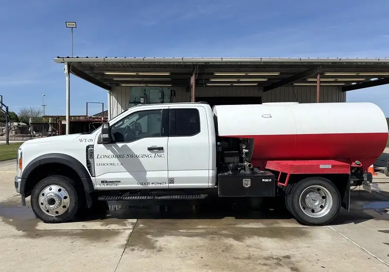 This picture is of the left side of the well casing jetter truck, used to clean well casings.